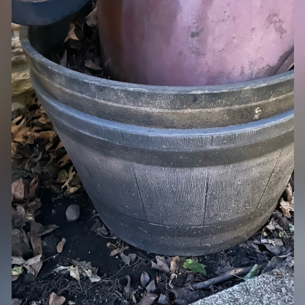 Two matching barrel planter buckets